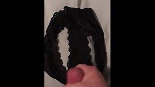 Cumming on wife's sexy black panties.