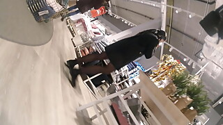 Candid Milf in black pantyhose shoping